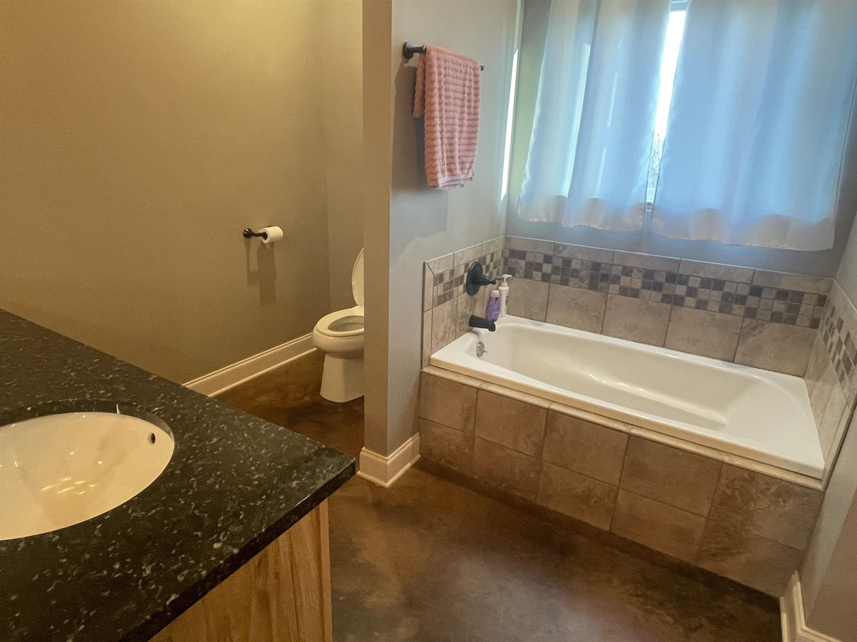 2680 Meacham Road Newbern, TN 38059 - Photo 12 of 13 a bathroom with a granite countertop sink and a mirror