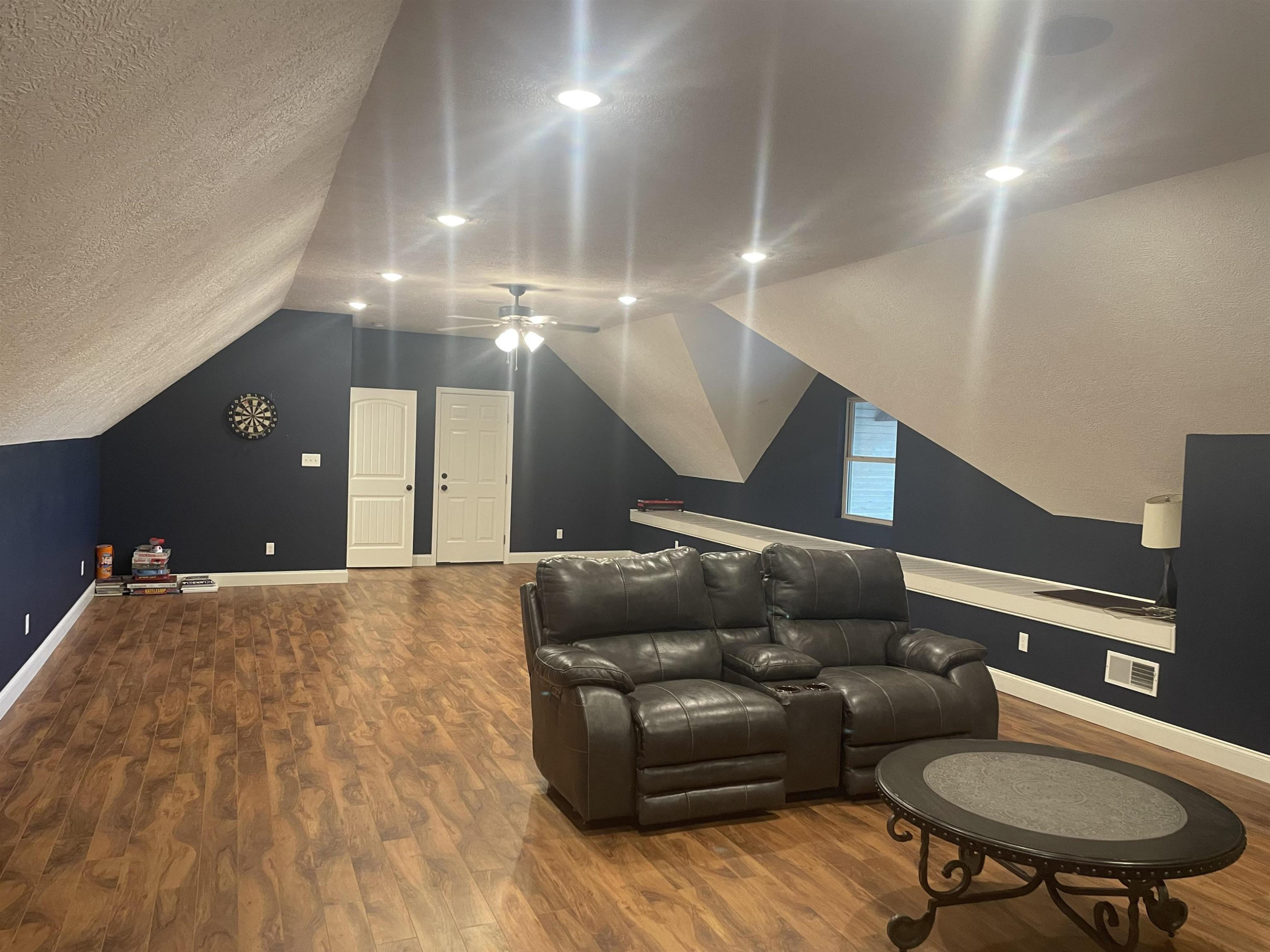 2680 Meacham Road Newbern, TN 38059 - Photo 4 of 13 a living room with furniture and a wooden floor