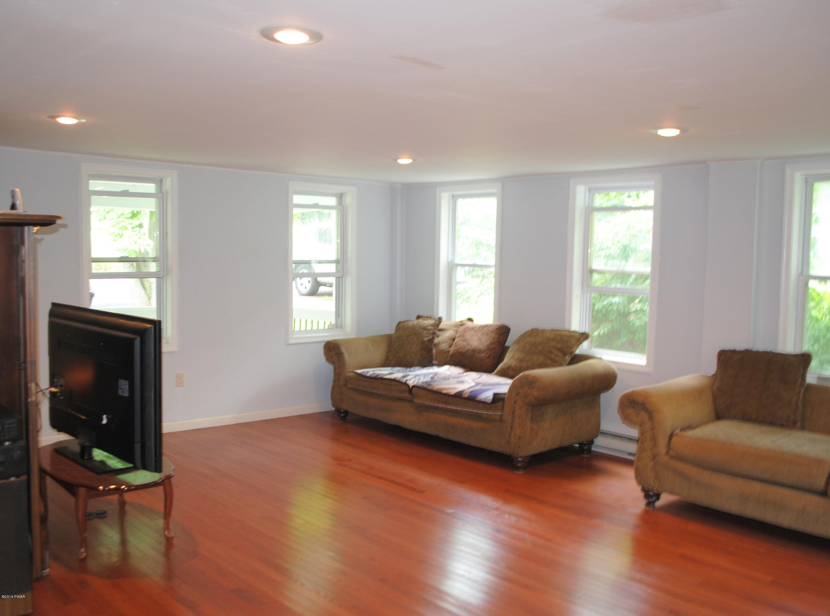 600 Neville Road Moscow, PA 18444 - Photo 23 of 35 a living room with furniture and wooden floor