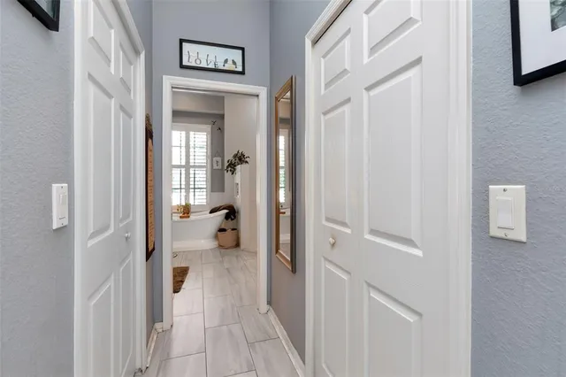 a bathroom with a sink mirror vanity and toilet