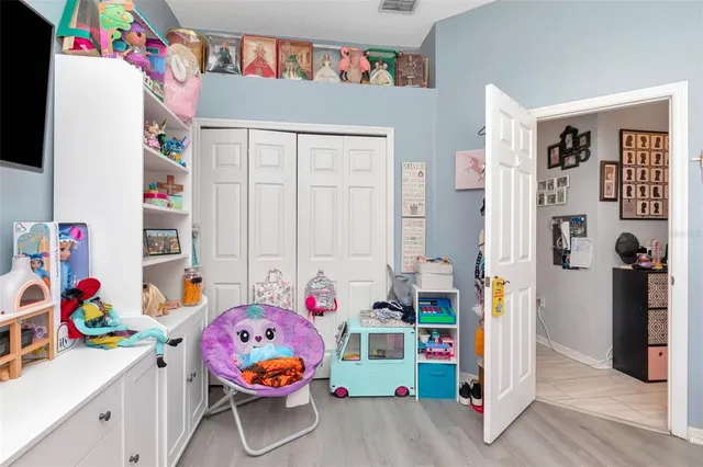a view of a swimming pool with outdoor seating