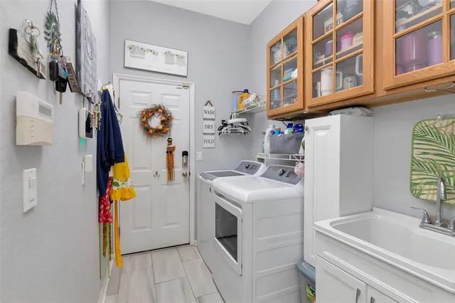 a view of a patio with a dining table and chairs