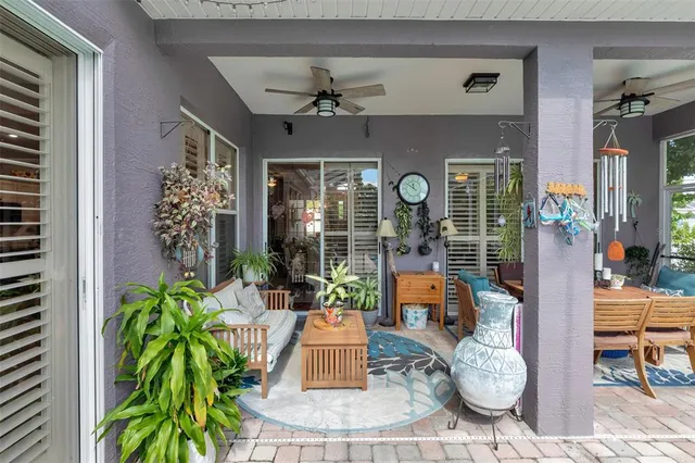 a view of a swimming pool with sitting area