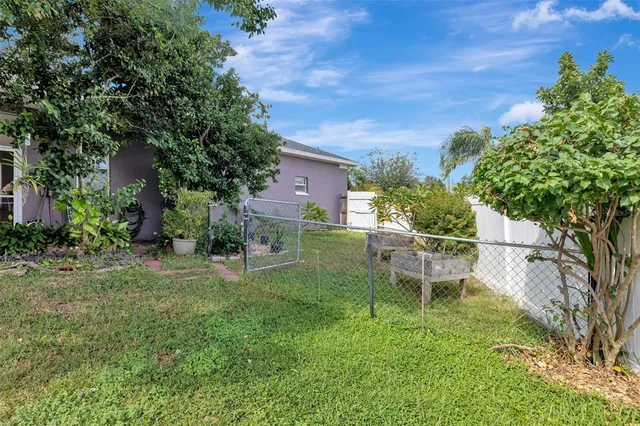 a backyard of a house with seating space
