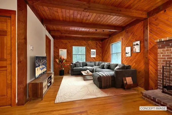 a view of a fireplace with wooden floor