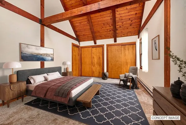 an empty room with a dresser