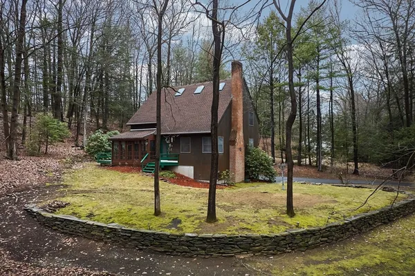a view of outdoor space with deck and garden