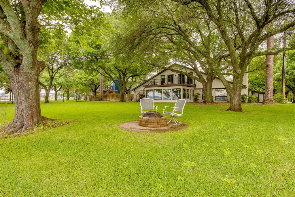 10814 Power Squadron Road Azle, TX 76020 - Photo 26 of 34 a front view of a house with a yard