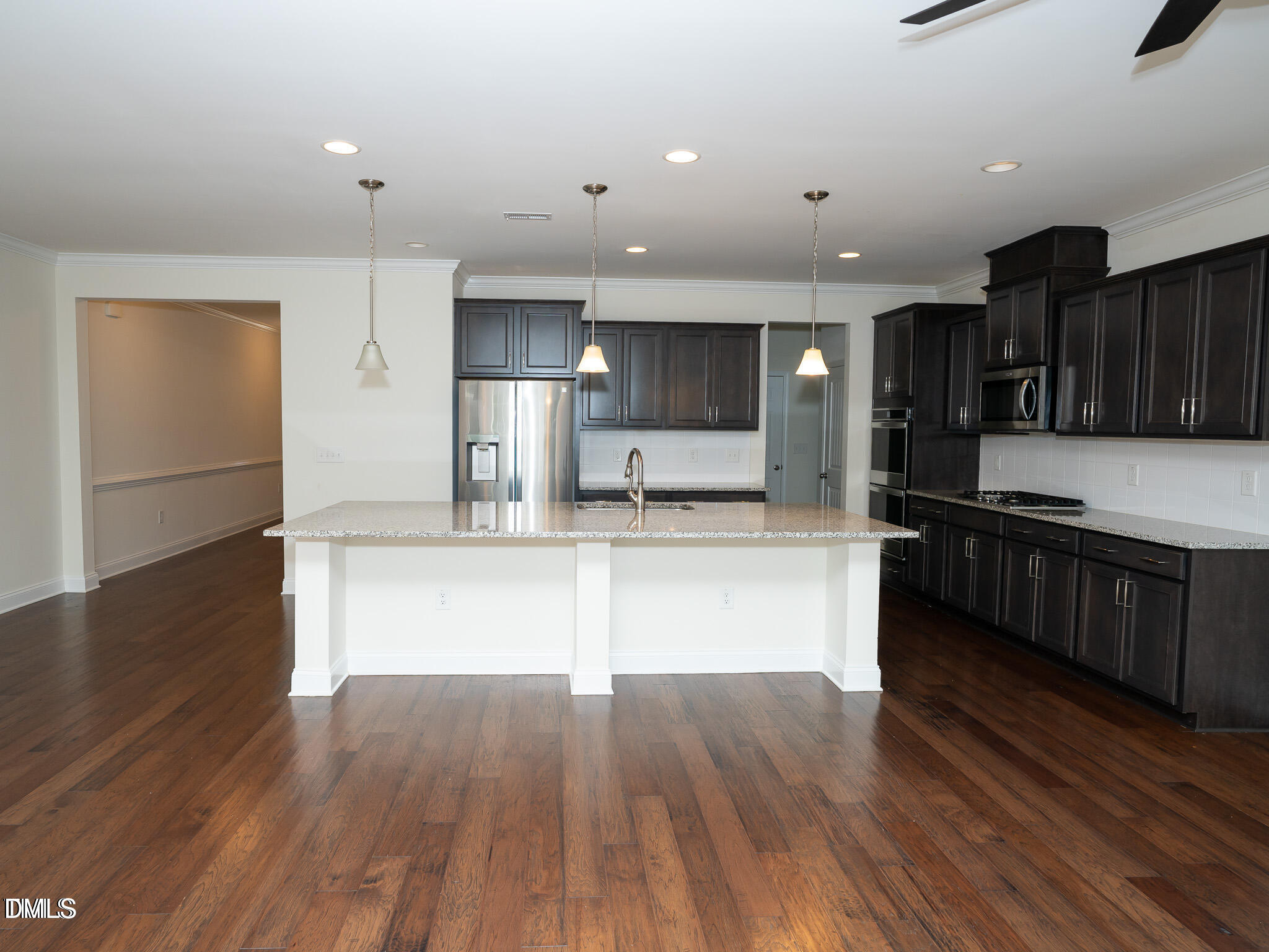 647 Newlyn Drive Raleigh, NC 27606 - Photo 12 of 53 a large kitchen with stainless steel appliances