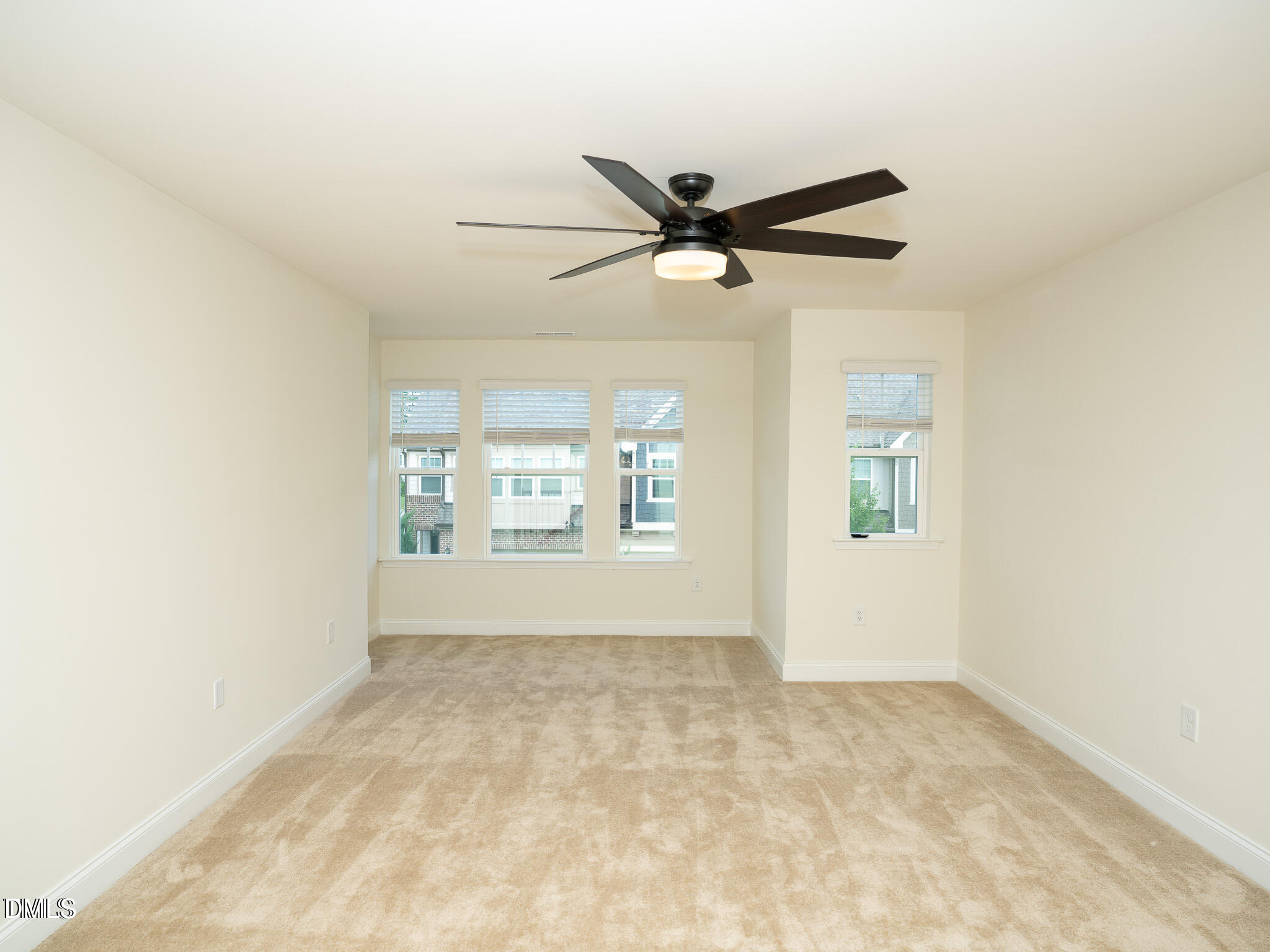 647 Newlyn Drive Raleigh, NC 27606 - Photo 29 of 53 a view of an empty room with a window