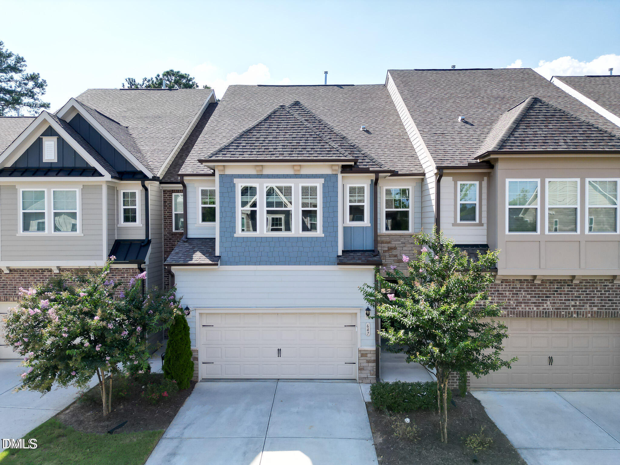 647 Newlyn Drive Raleigh, NC 27606 - Photo 4 of 53 front view of a house with a yard