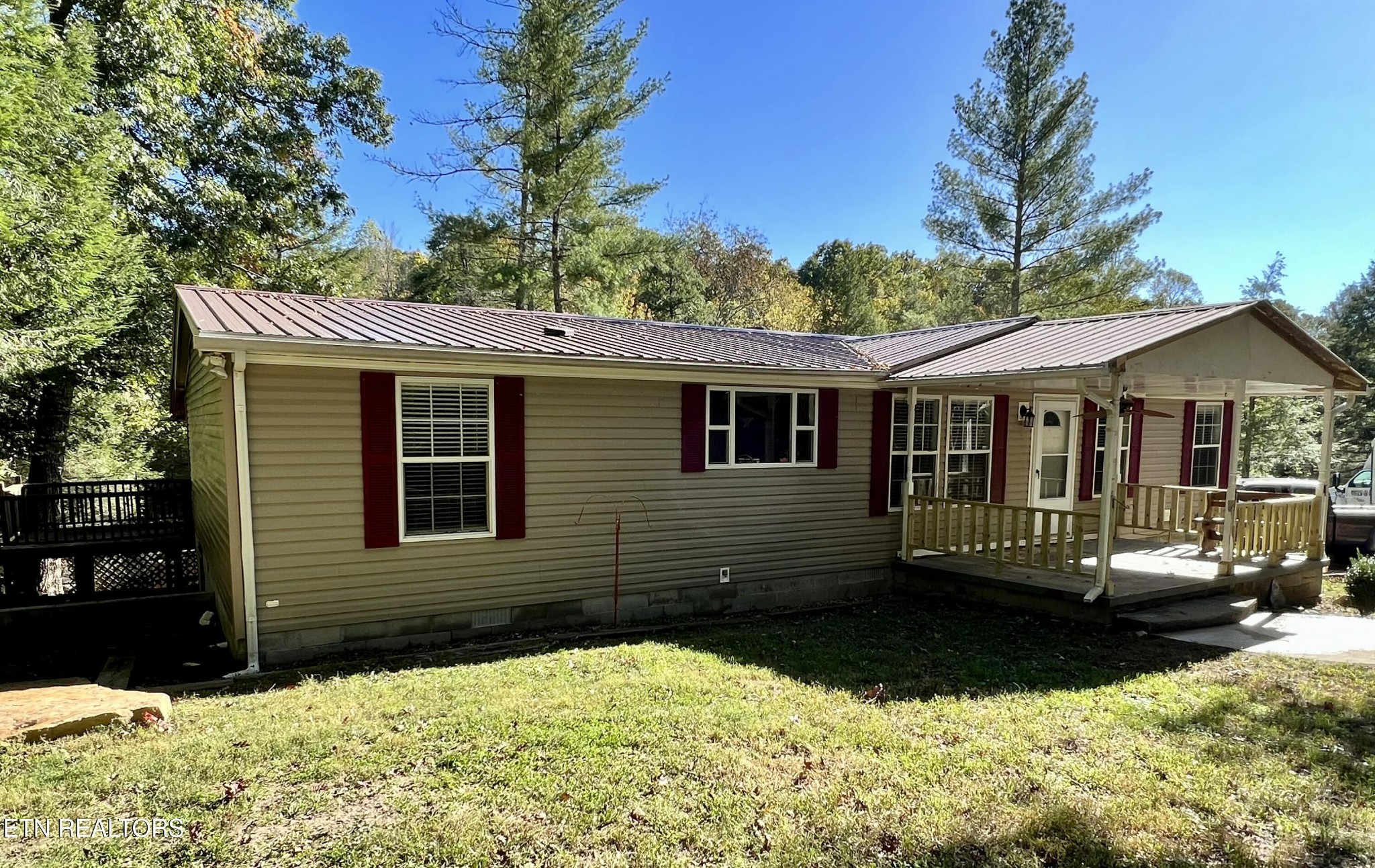123 Doc Huling Road Robbins, TN 37852 - Photo 2 of 23 a view of a house with a yard
