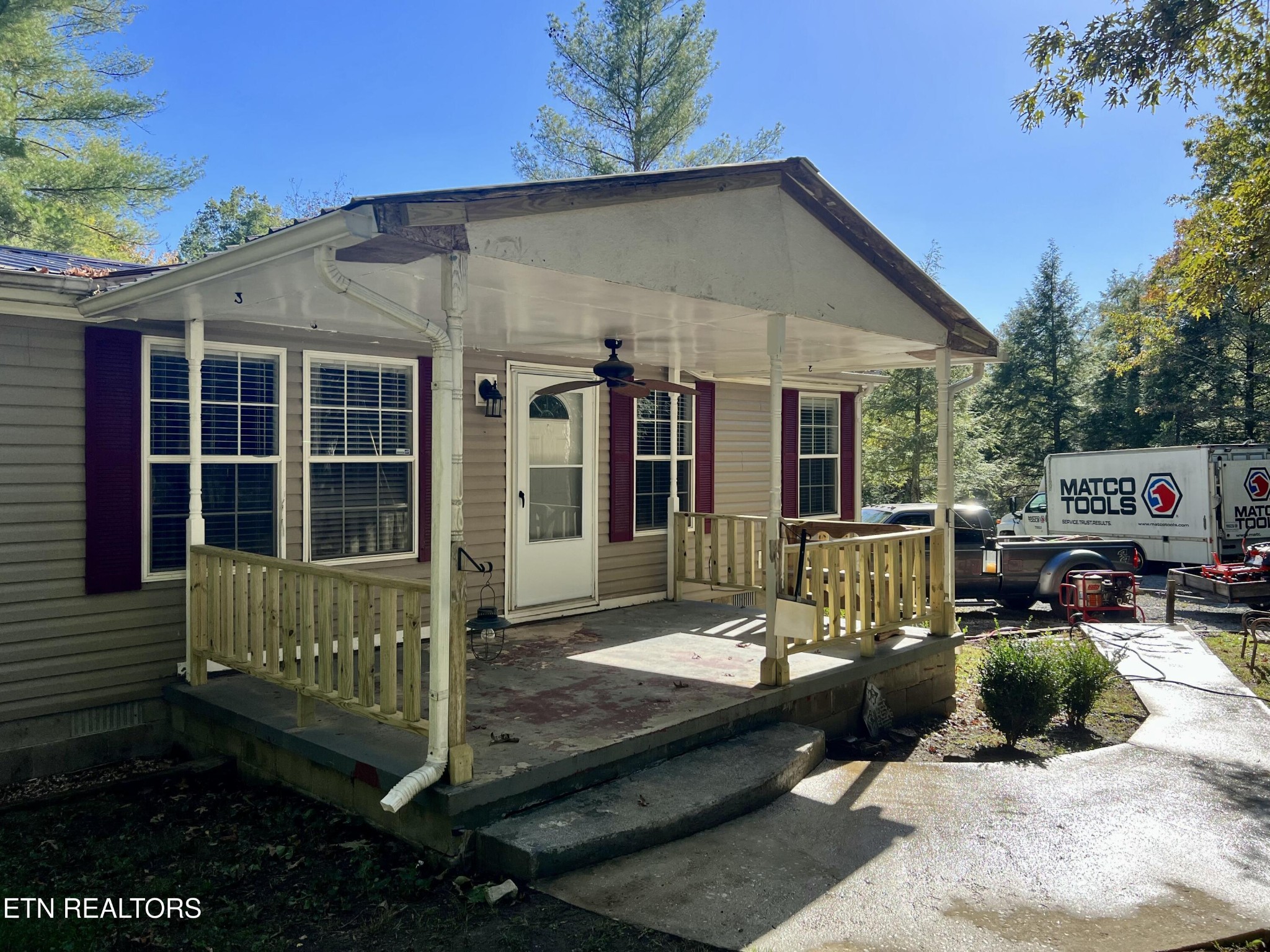 123 Doc Huling Road Robbins, TN 37852 - Photo 4 of 23 a view of a house with a patio