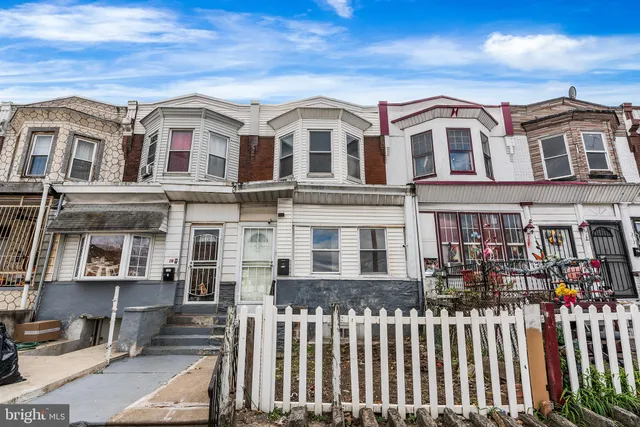 a front view of a multi story residential apartment building