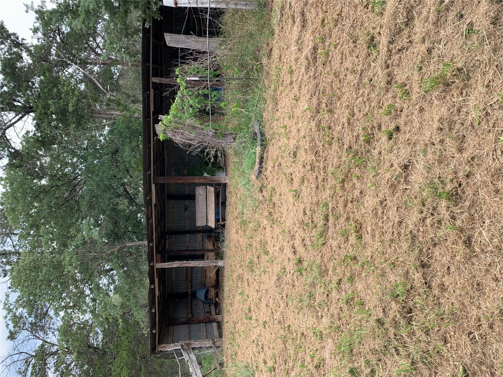 276 Ott Road Rosanky, TX 78953 - Photo 12 of 27 a front view of a house with a garden