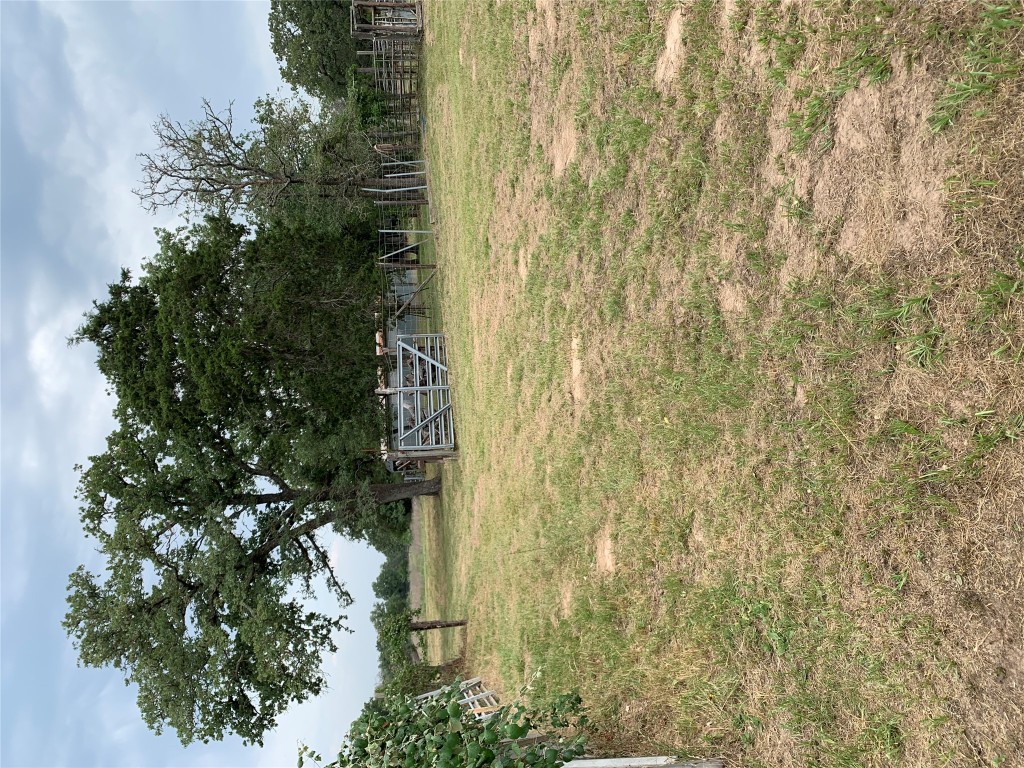 276 Ott Road Rosanky, TX 78953 - Photo 3 of 27 a backyard of a house with lots of green space
