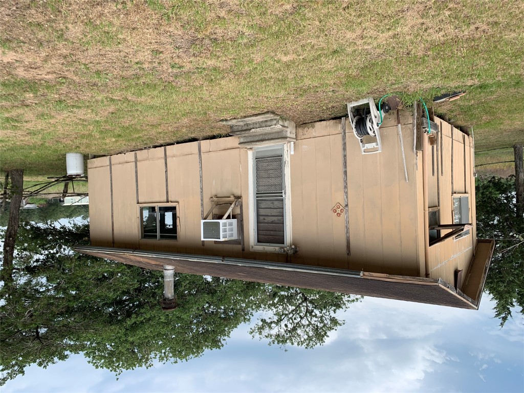 276 Ott Road Rosanky, TX 78953 - Photo 4 of 27 a backyard of a house with lots of green space