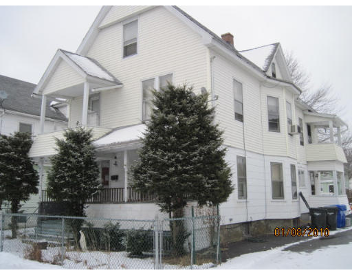 39-41 Sterling Street Springfield, MA 01107 - Photo 1 of 1 a front view of a house with a yard