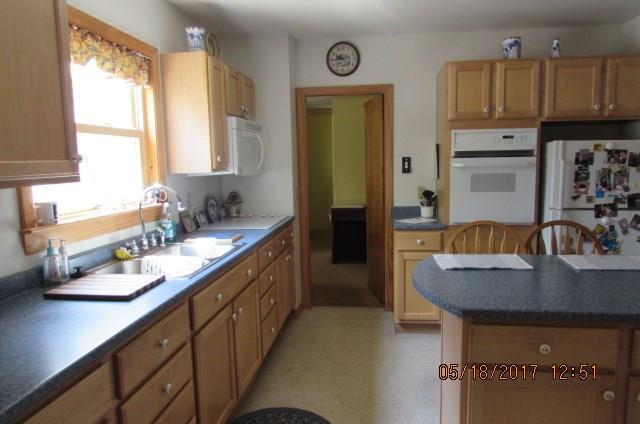 59 Enfield Road Lincoln, ME 04457 - Photo 8 of 32 Up dated Kitchen bright and clean.