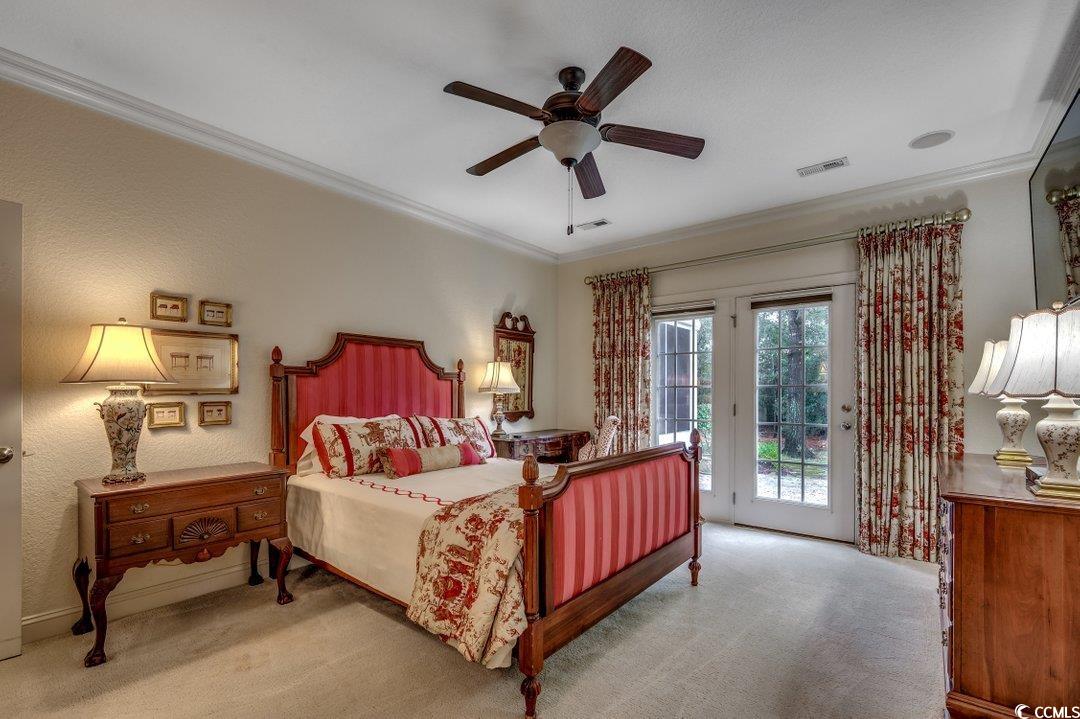908 Corrado Street Myrtle Beach, SC 29572 - Photo 8 of 33 Carpeted bedroom with access to exterior, ceiling fan, and ornamental molding
