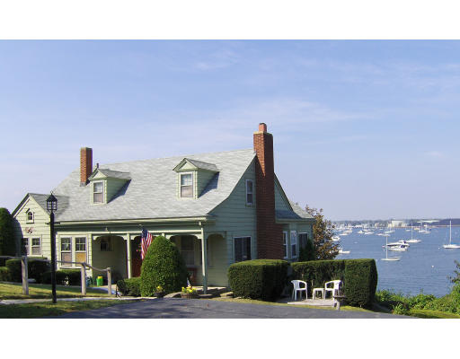 3 Kenneth Road Marblehead, MA 01945 - Photo 1 of 4 a front view of a house with a yard