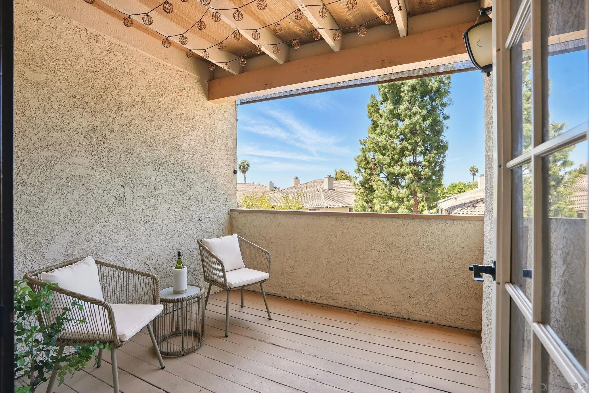 3545 Paseo De Francisco, Unit 231 Oceanside, CA 92056 - Photo 12 of 50 a view of balcony with furniture and garden