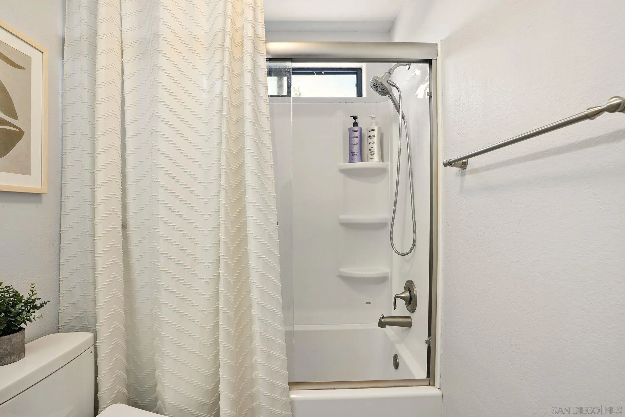 3545 Paseo De Francisco, Unit 231 Oceanside, CA 92056 - Photo 18 of 50 a bathroom with a shower
