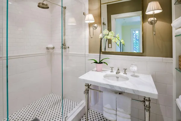 a bathroom with a sink and a mirror
