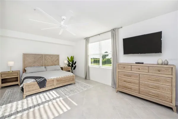 a bathroom with double sink and a mirror