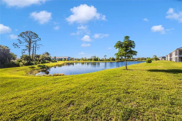 a view of a lake with a outdoor space