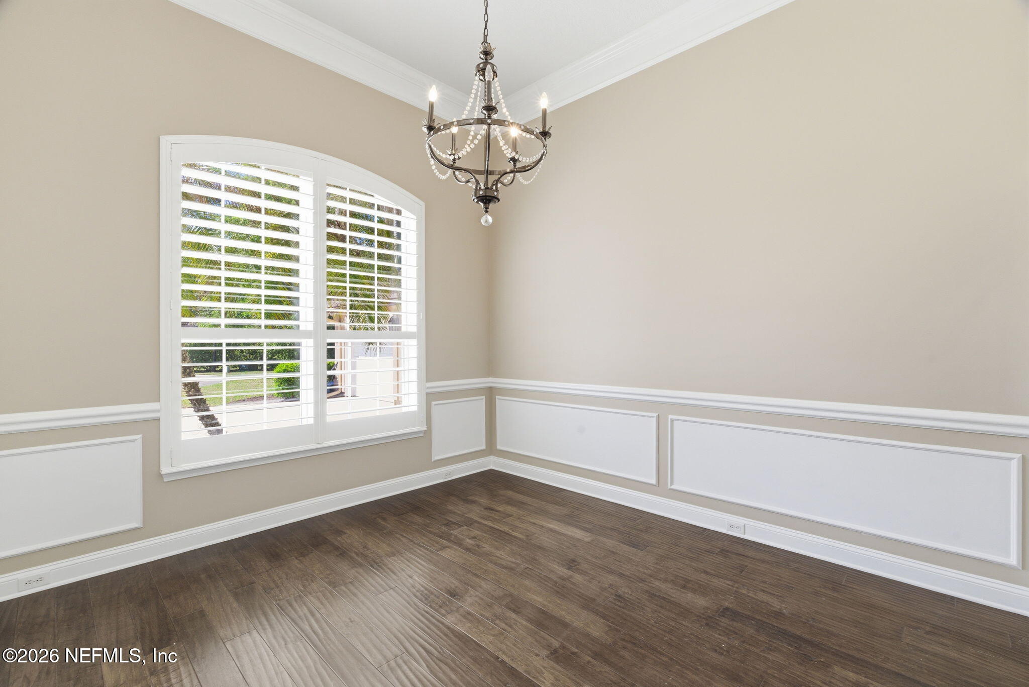 1600 Spring Water Court Fleming Island, FL 32003 - Photo 18 of 85 a view of a room with wooden floor and windows
