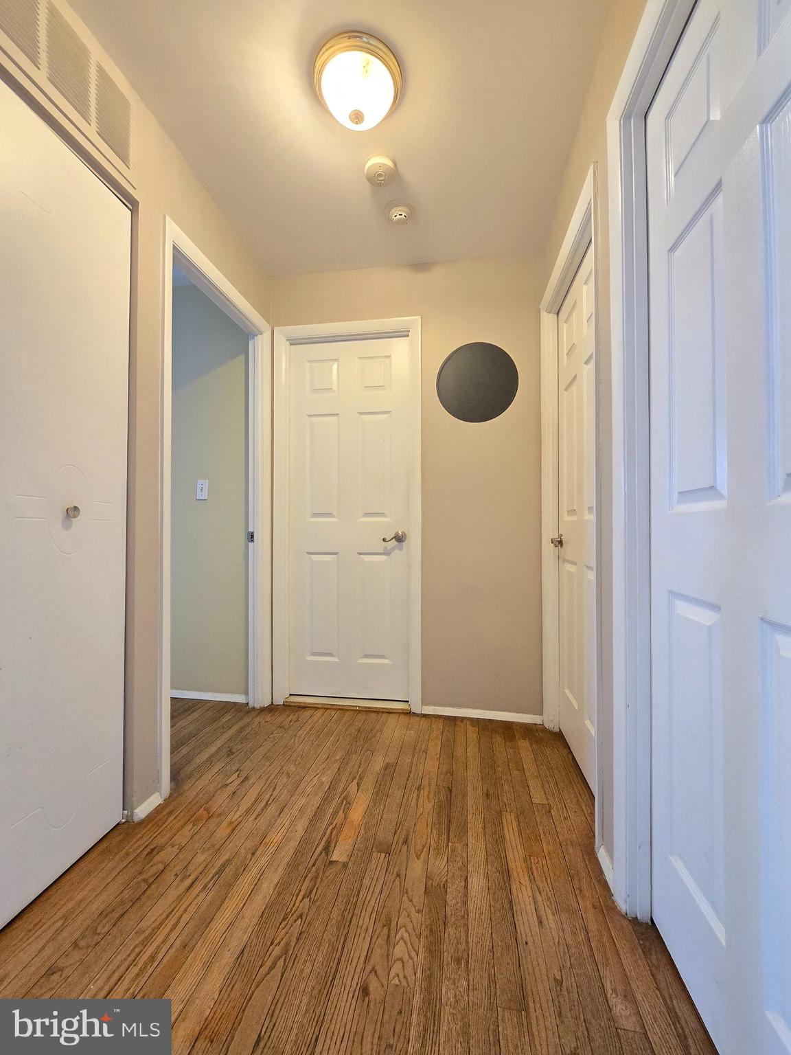 9003 Bruno Road Randallstown, MD 21133 - Photo 11 of 25 a view of empty room with wooden floor