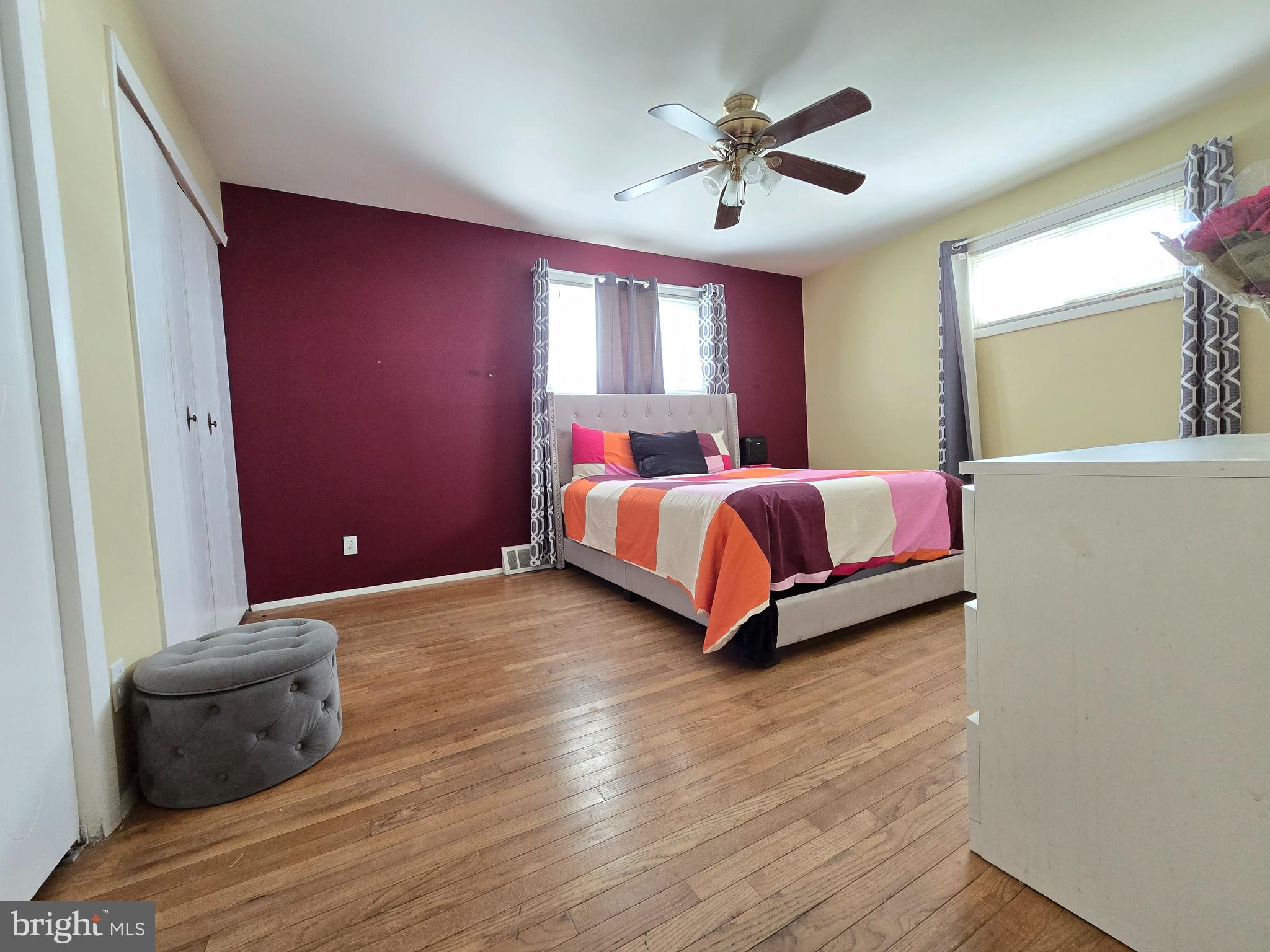 9003 Bruno Road Randallstown, MD 21133 - Photo 12 of 25 a living room with a bed furniture and a window