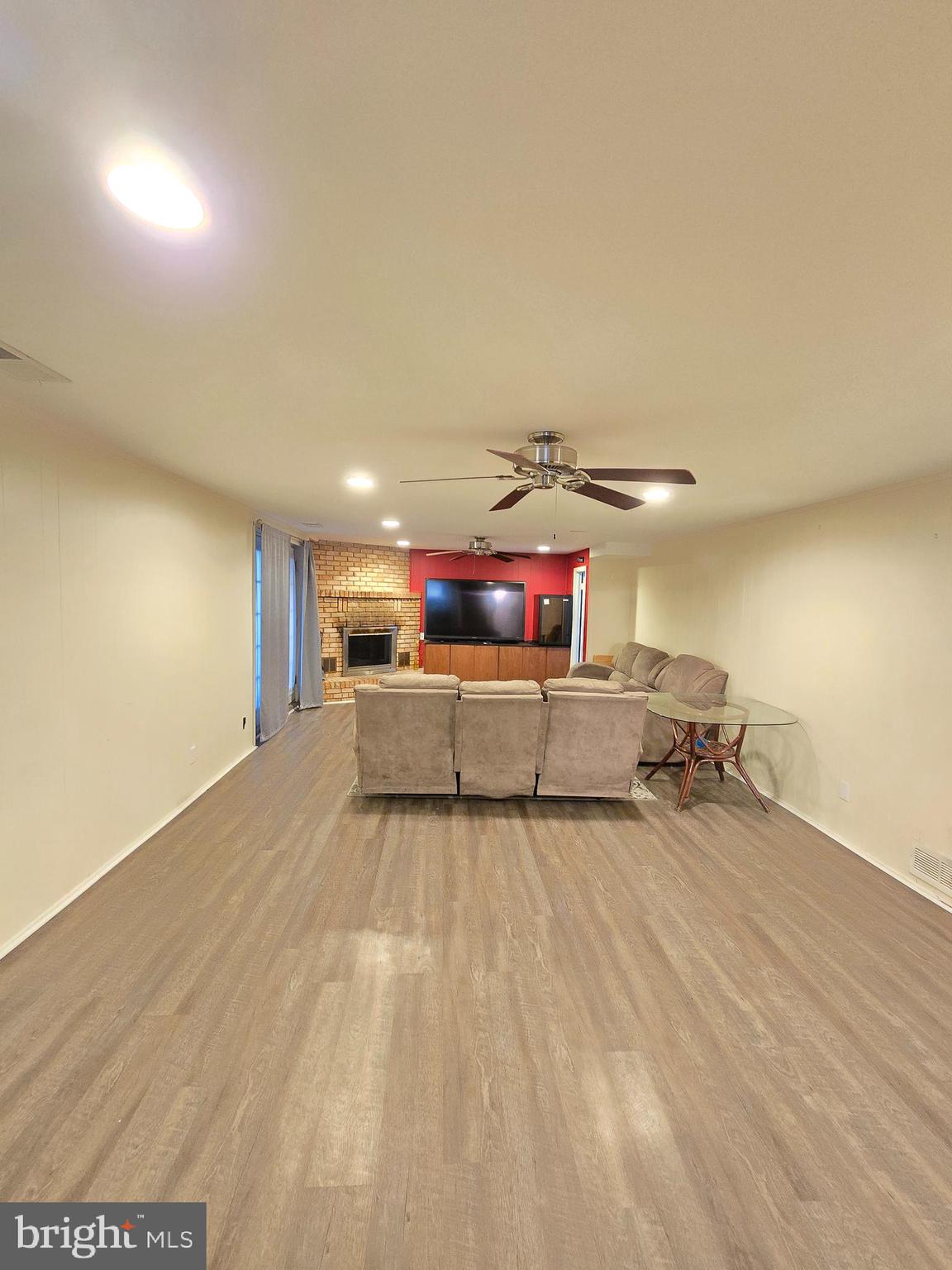9003 Bruno Road Randallstown, MD 21133 - Photo 17 of 25 a living room with furniture and a table