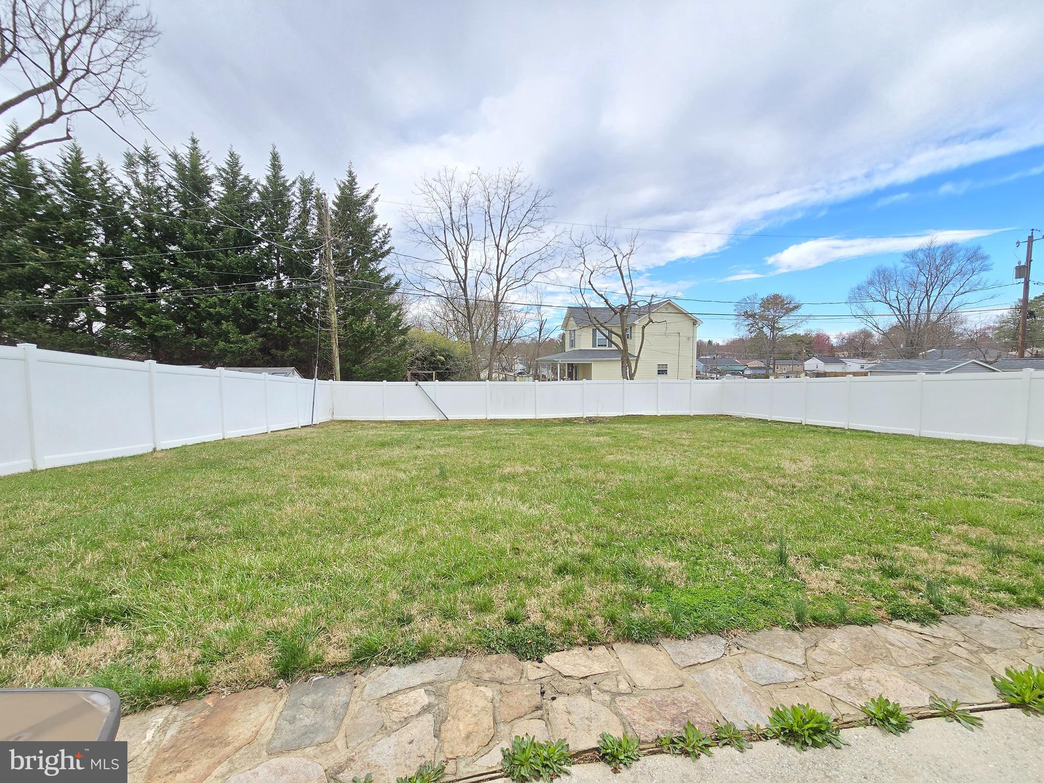 9003 Bruno Road Randallstown, MD 21133 - Photo 24 of 25 a view of yard with swimming pool and green space