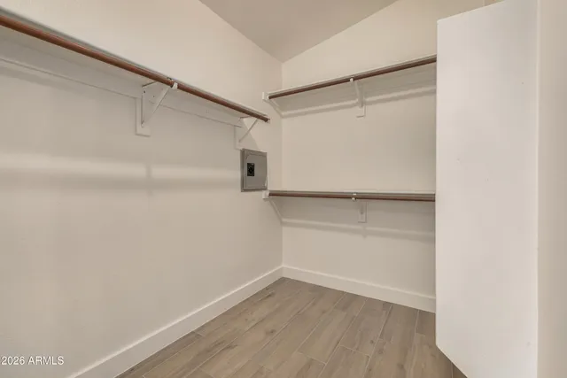 a view of an empty walk in closet