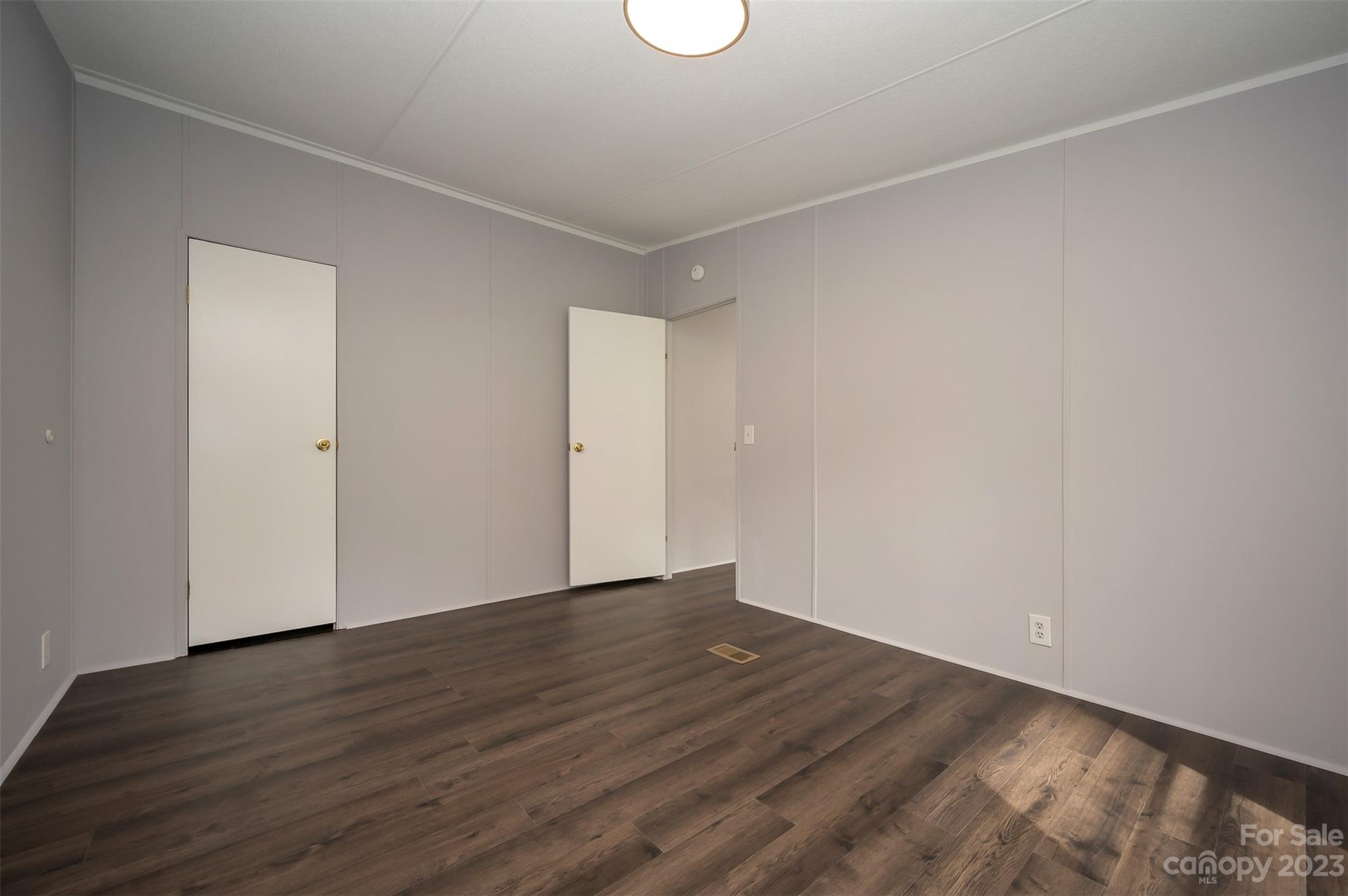 481 Brooks Road Bostic, NC 28018 - Photo 16 of 28 a view of an empty room with wooden floor