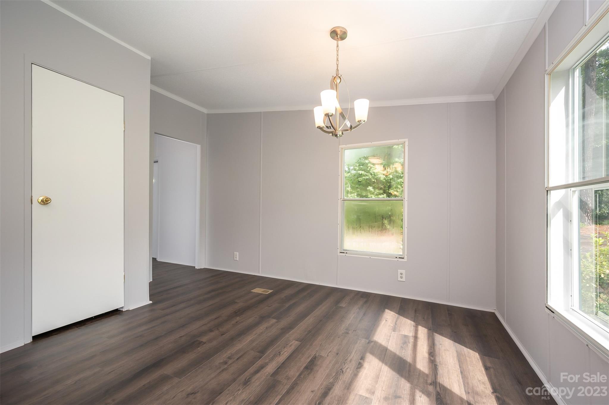 481 Brooks Road Bostic, NC 28018 - Photo 7 of 28 a view of empty room with wooden floor and window
