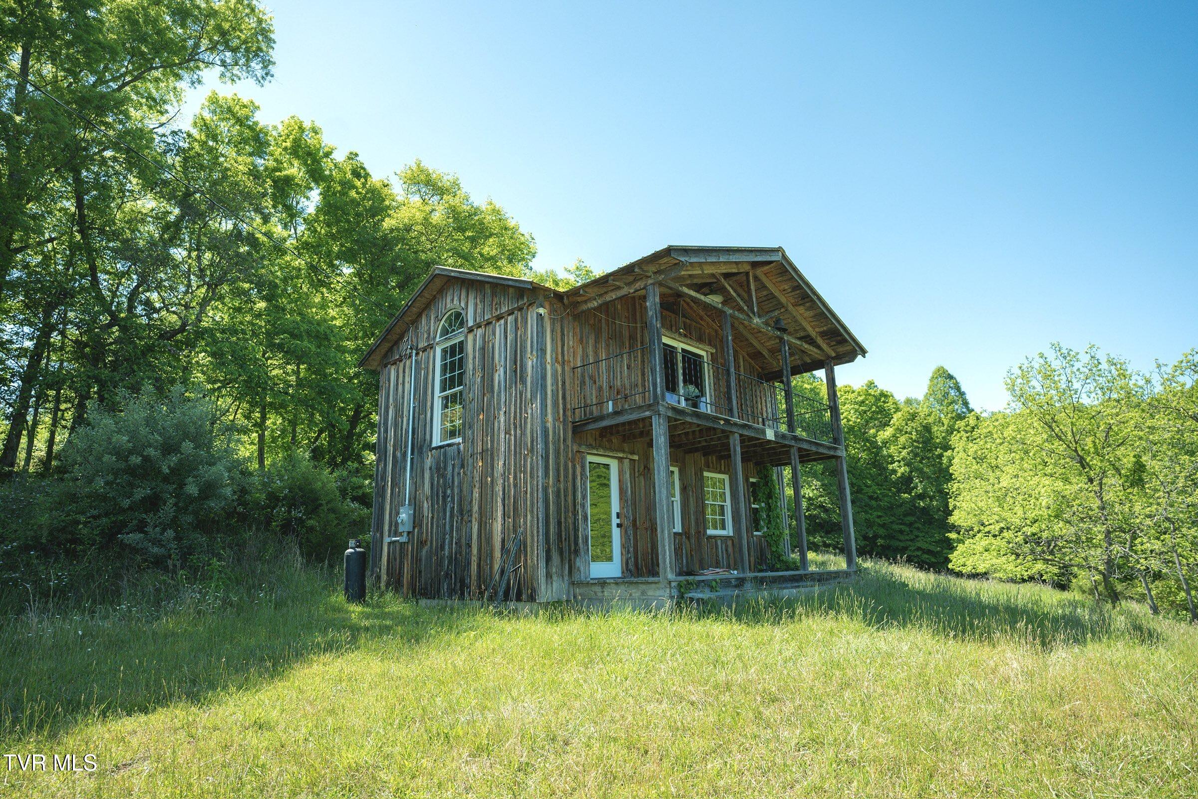4892 Limestone Vly Road Duffield, VA 24244 - Photo 1 of 17 Cabin_ExteriorShot2