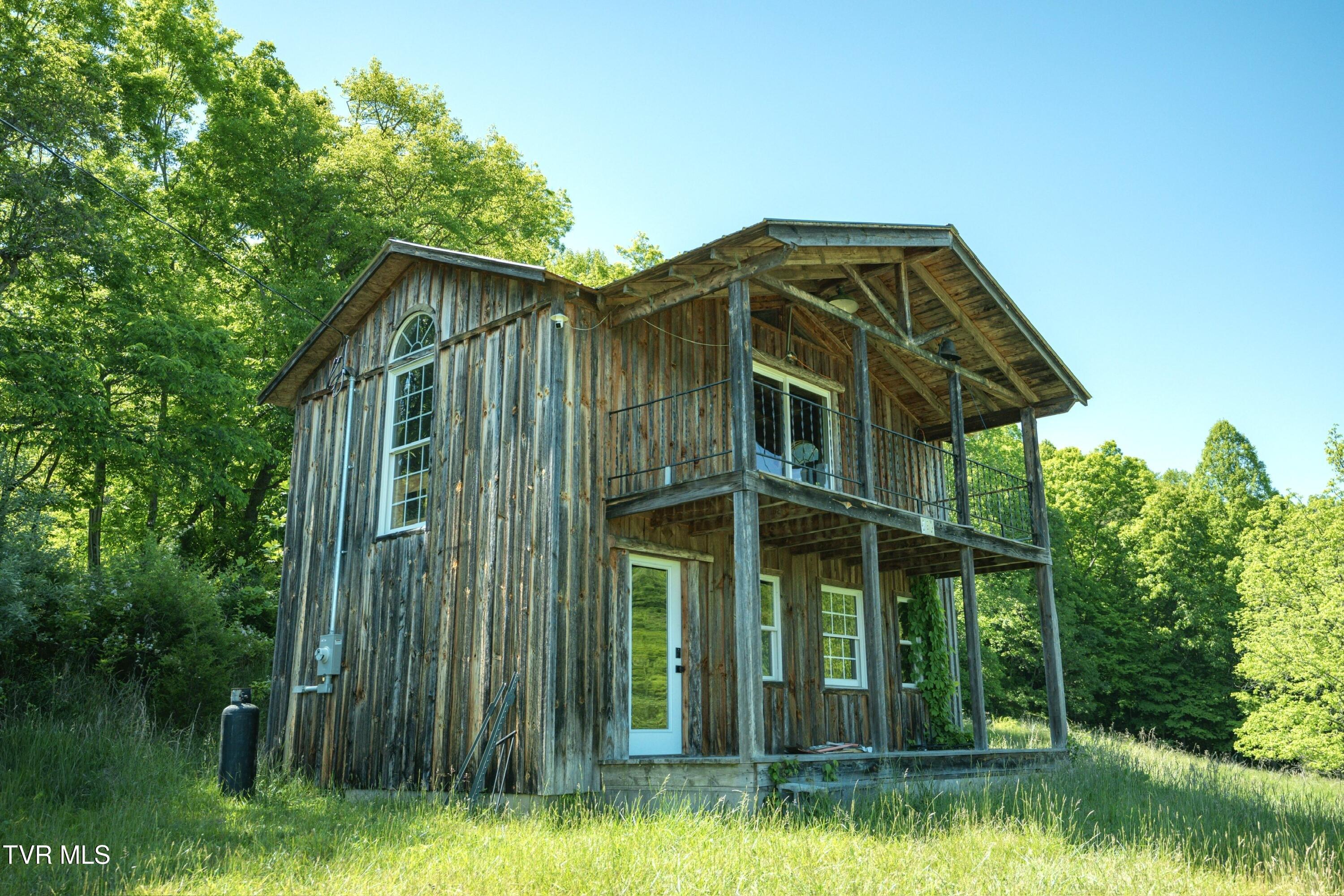 4892 Limestone Vly Road Duffield, VA 24244 - Photo 2 of 17 Cabin_ExteriorShot