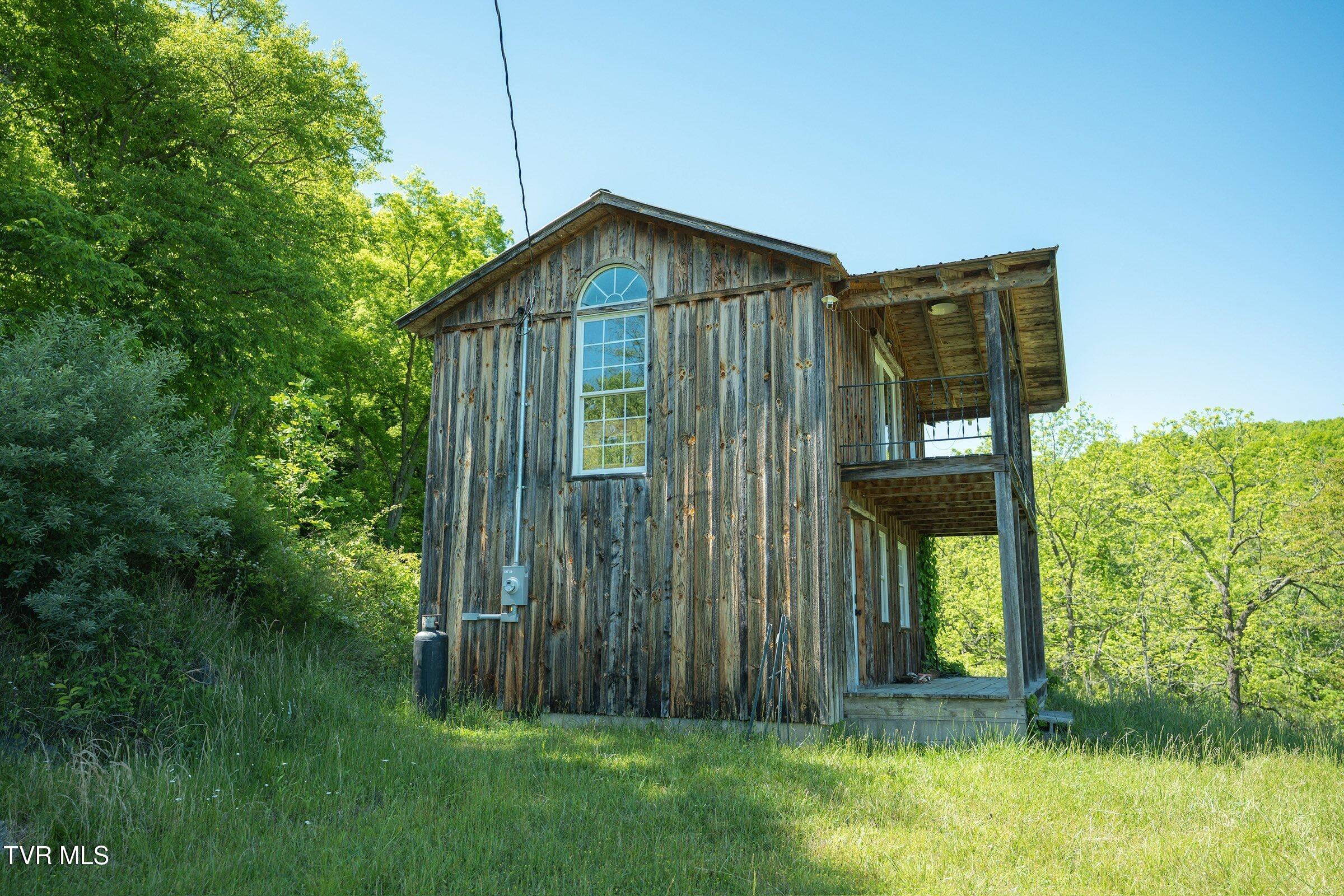 4892 Limestone Vly Road Duffield, VA 24244 - Photo 3 of 17 Cabin_ExteriorShot3