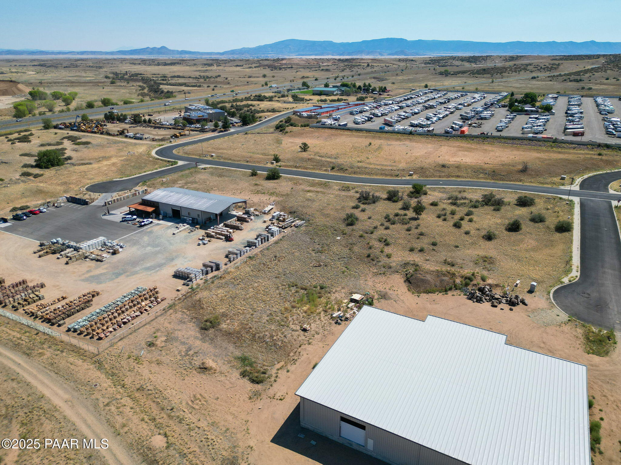 2890 Benchmark Avenue Prescott, AZ 86301 - Photo 9 of 13 an aerial view of residential houses with outdoor space