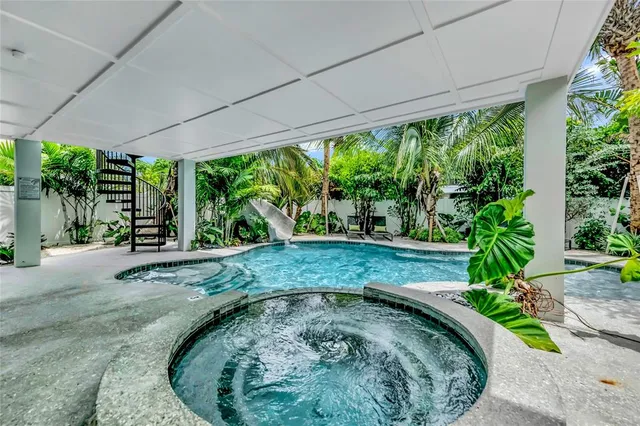 a view of a backyard with a garden