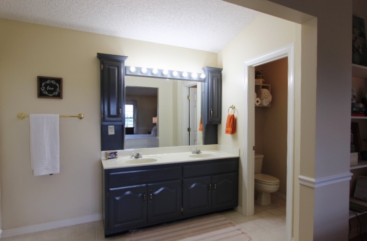 3157 Buckeye Road Erin, TN 37061 - Photo 14 of 41 a spacious bathroom with a double vanity sink and a mirror