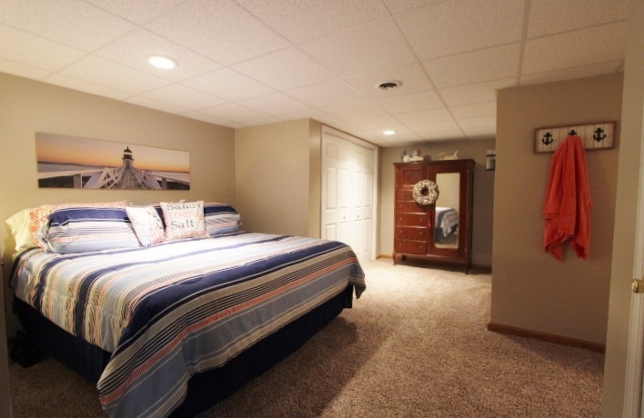 3157 Buckeye Road Erin, TN 37061 - Photo 21 of 41 a bedroom with a bed and a walk in closet