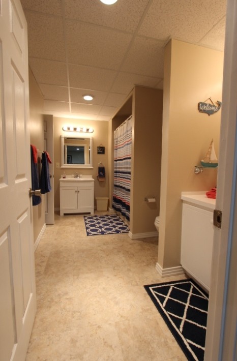 3157 Buckeye Road Erin, TN 37061 - Photo 22 of 41 a bathroom with a sink a toilet and shower