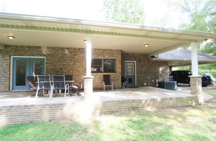 3157 Buckeye Road Erin, TN 37061 - Photo 30 of 41 a view of a swimming pool with outdoor seating