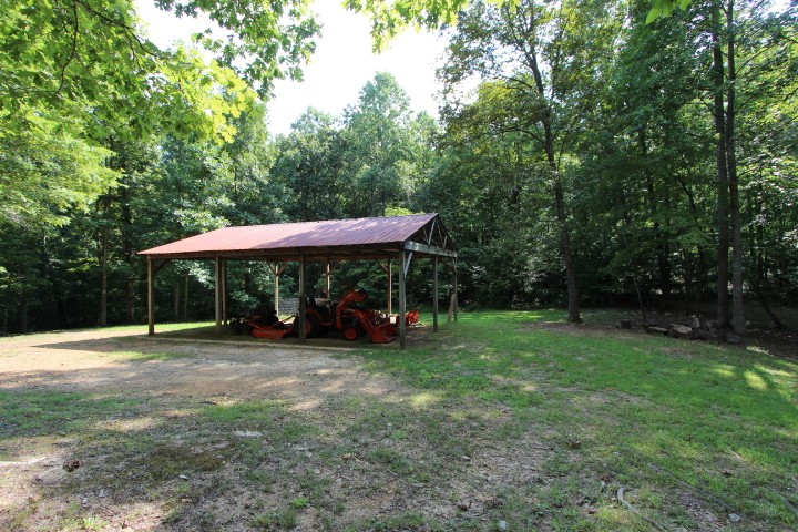 3157 Buckeye Road Erin, TN 37061 - Photo 32 of 41 a view of backyard with a patio and deck