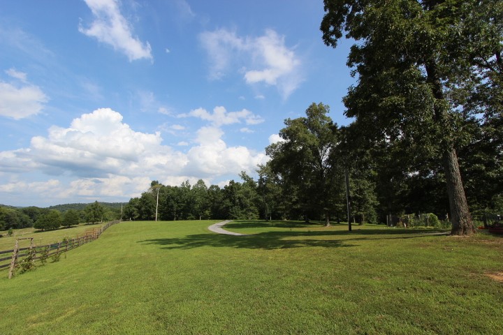 3157 Buckeye Road Erin, TN 37061 - Photo 37 of 41 a view of a golf course with a lake