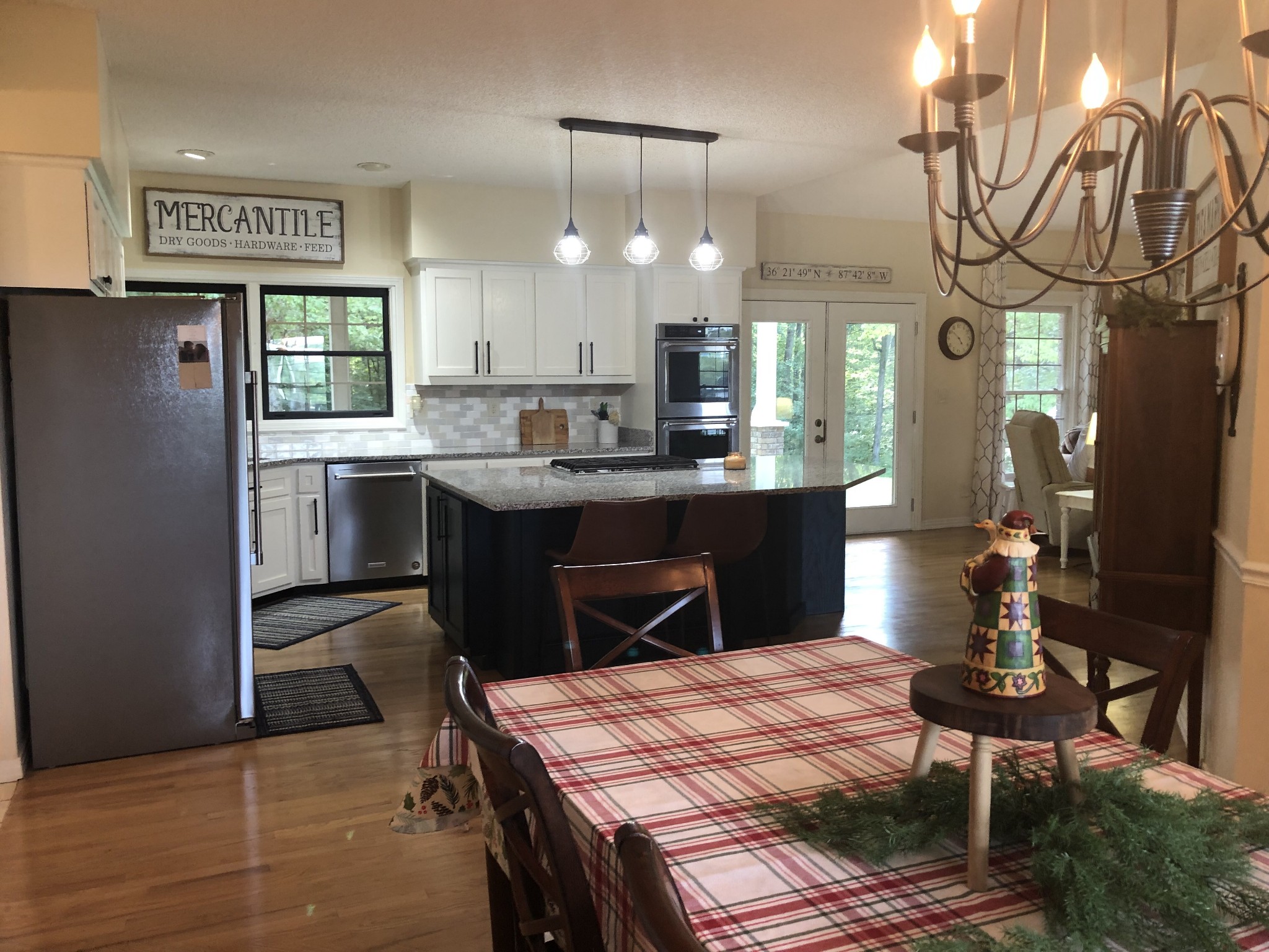 3157 Buckeye Road Erin, TN 37061 - Photo 10 of 41 a kitchen with kitchen island a sink appliances and cabinets